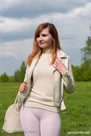 Sexy redhead Jeny Smith wears her see thru leggings in the park