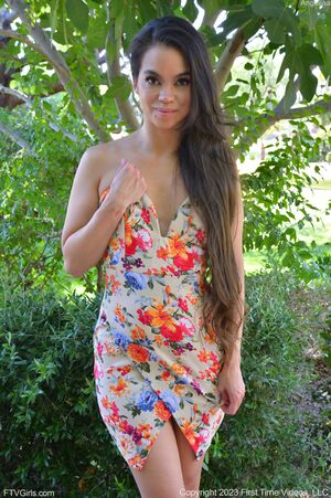 Angelina in Floral Dress And High Heels at FTV Girls