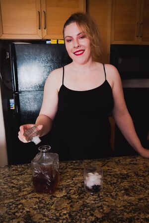 Lana Del Lust in Black Dress And Bourbon