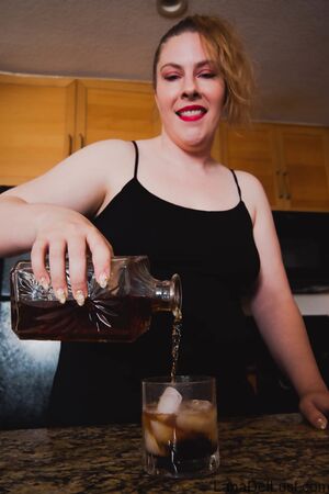 Lana Del Lust in Black Dress And Bourbon