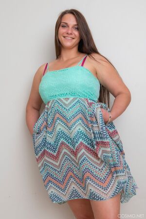 Billy Wall in Strips Off Her Dress at Cosmid