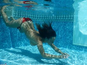 Nikki Sims in Red Bikini
