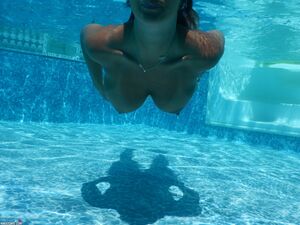 Nikki Sims in Red Bikini