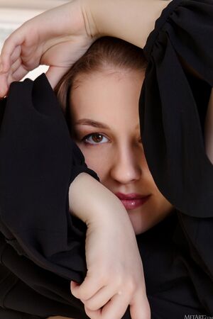 Isabele in Light And Shadow at MetArt