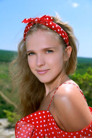 Xenia in Countryside Charm at MetArt