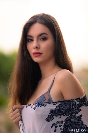 Liz Ocean Balcony Strip Erotica