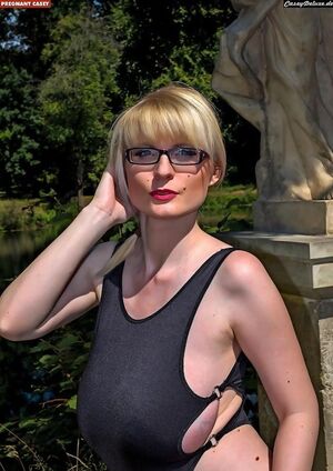 Casey Deluxe in Black Bodysuit Public Nudity