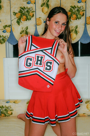 Nika Forde in Cheerleader Set at Cosmid